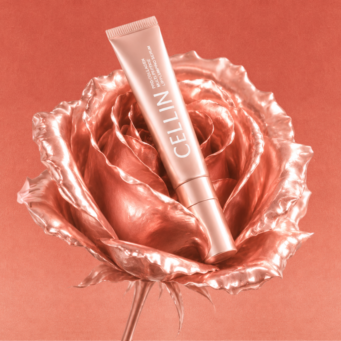 CELLIN lip plumping serum resting in a rose-gold rose